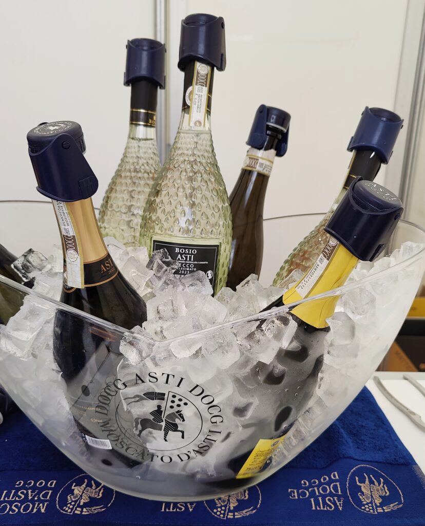 Icebucket with several bottle sof sparkling Asti wine